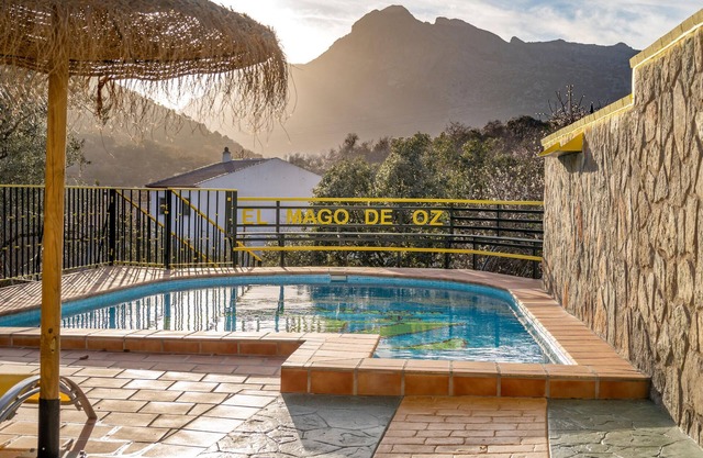 Enjoy a magnificent mountain panorama in this spacious vacation home with pool.