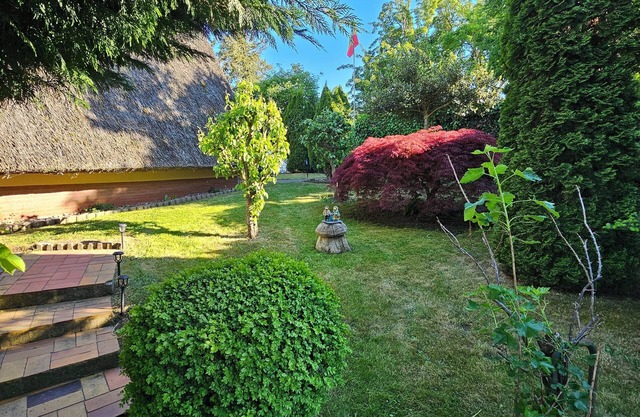 Enjoy a vacation close to the Baltic Sea in a Finnhütte directly on the Saaler Bodden.