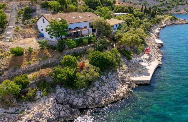 Enjoy an oasis of peace and beauty right by the sea on your next vacation.