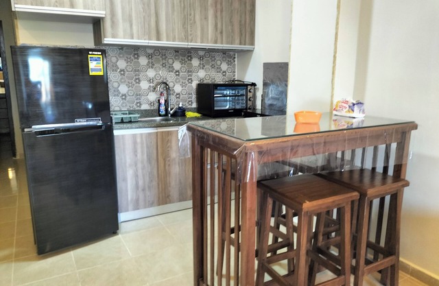 Enjoy Beachfront apartment at elite resort , pool, Wi-Fi, unique location.