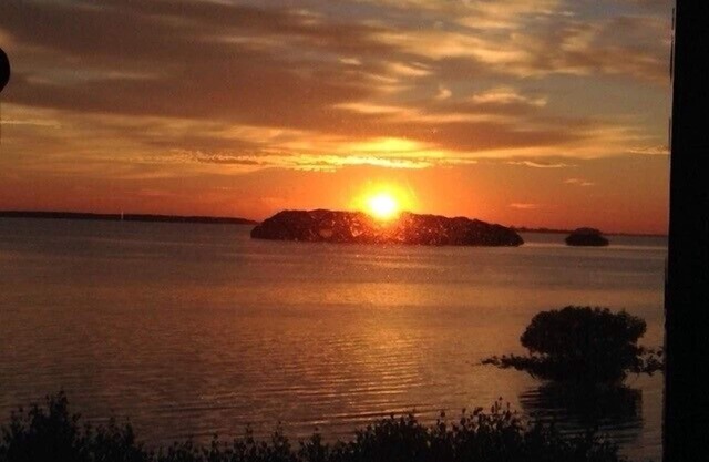 Enjoy gorgeous water views and incredible sunrises from this waterfront condo