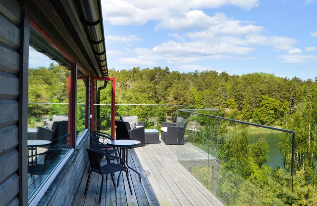 Enjoy relaxing baths in the jacuzzi with sea view in this vacation home.