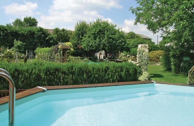 Enjoy the comfort in this beautiful vacation home with community pool.