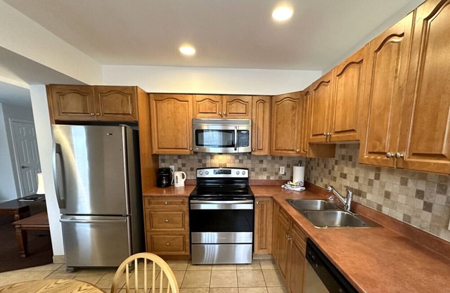 Escape to a 2 bdrm home in quiet area w/full kitchen, private patio w/BBQ
