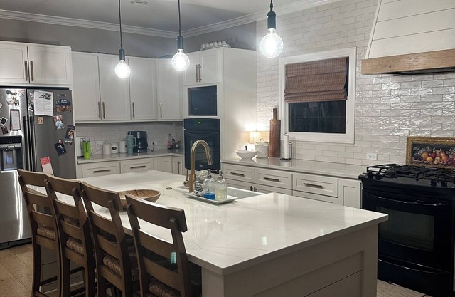 Escape to Serenity: Cozy Ranch Style Home with Charming Wrap-Around Porch.