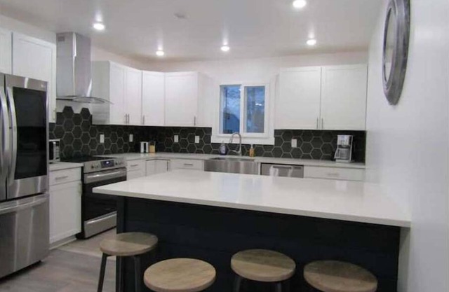 Exceptional Home with Htd Garage in Town