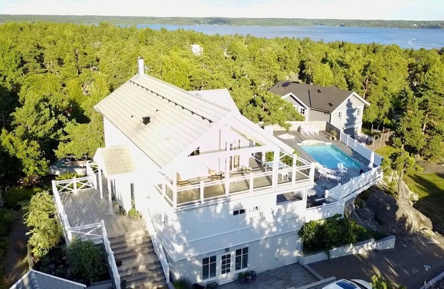 Exclusive house with pool and sea view of Stockholm archipelago near nature and city.