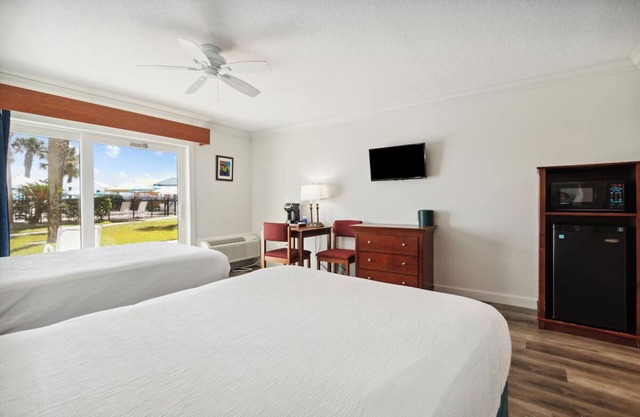 Explore Local Gems from a Relaxing Beachfront Room with Outdoor Swimming Pool