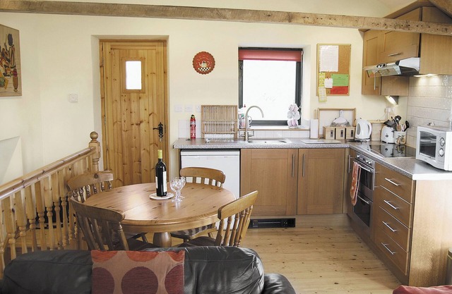 External stone steps to 1st floor entrance.