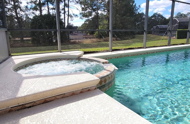 Fabulous 4 bed overlooking water and conservation with south facing pool area