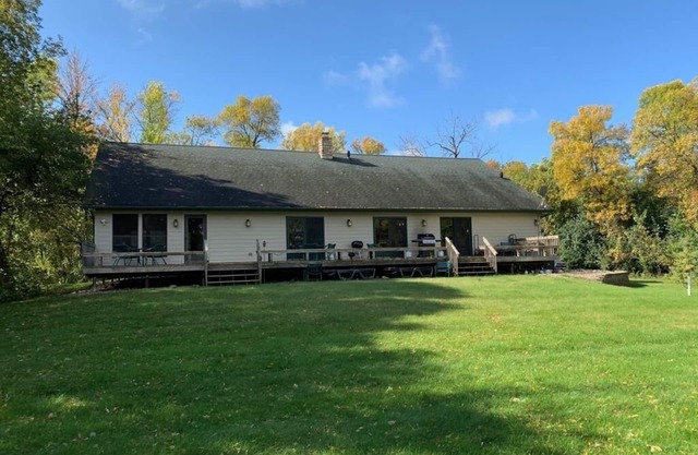 Family cabin situated between two lakes and next to acres of private woodlands.