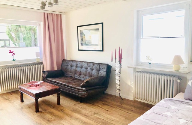 Family/comfort room with shared bathroom