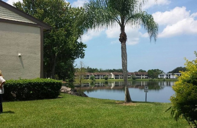 family friendly, gated community, two pools, lake outside back door.