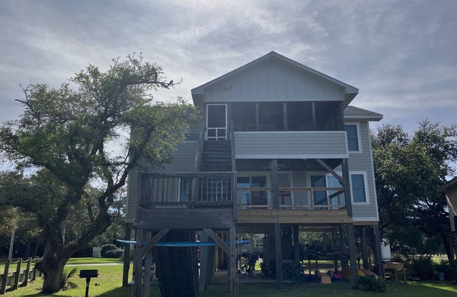 Family friendly home located directly on a canal with sound access and dock!