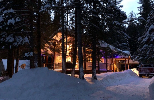 Family-friendly lakefront cabin setting with beach and boatslip.