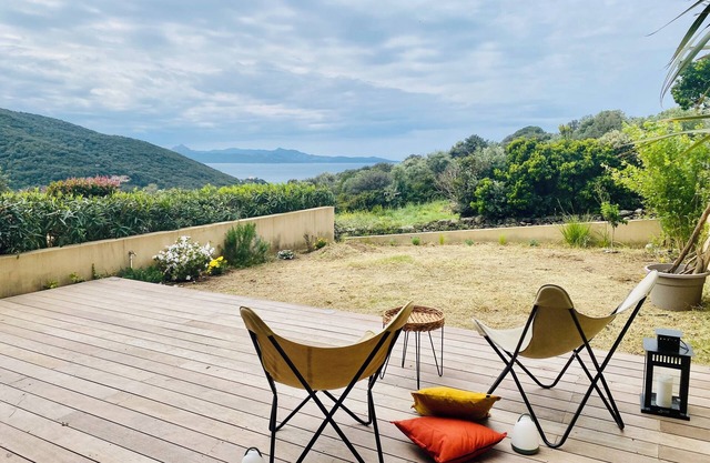 Farinole near Saint-Florent. Terrace and garden with sea view, Sandy beach within walking distance