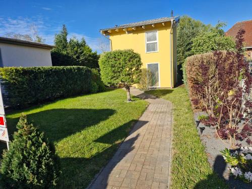 Ferienhaus an der Brunnenaue 4 Sterne, E-Ladestation am Haus, Wlan, Netflix, Garten