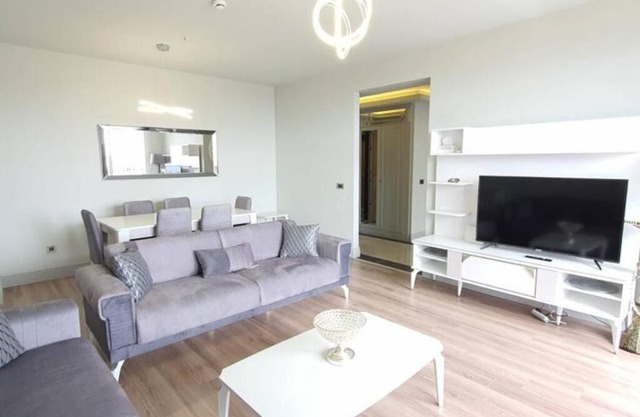 FIRST AVENUE 2 bedrooms, Livingroom with a charming sea view