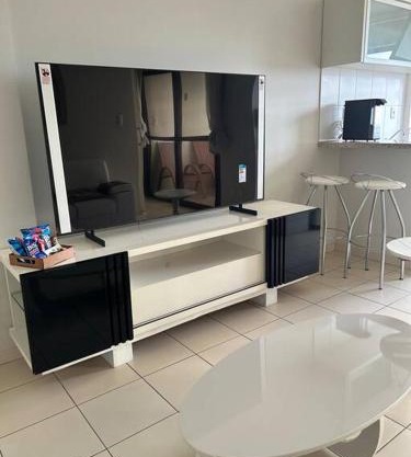 Flat completo no centro.