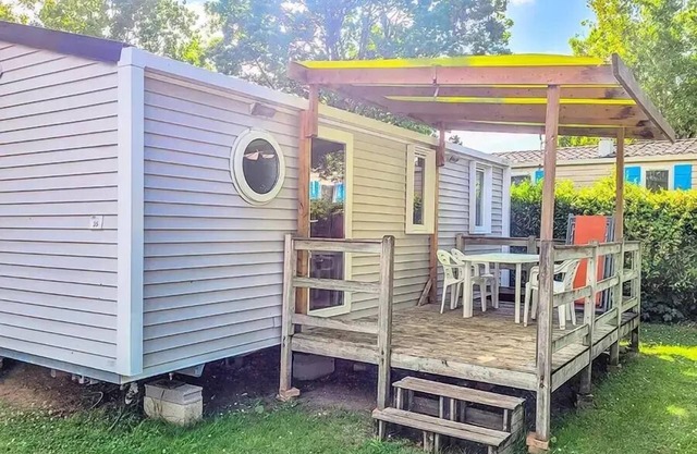 Flower Camping L'Abri-Côtier * - Mobilhome Family 29m2 CONFORT - 3 bedrooms + covered terrace + TV 6 persons