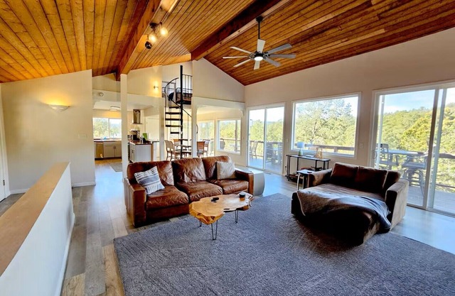 Four-bedroom house. Three levels of decks & private hot tub. NO CLEANING FEE!