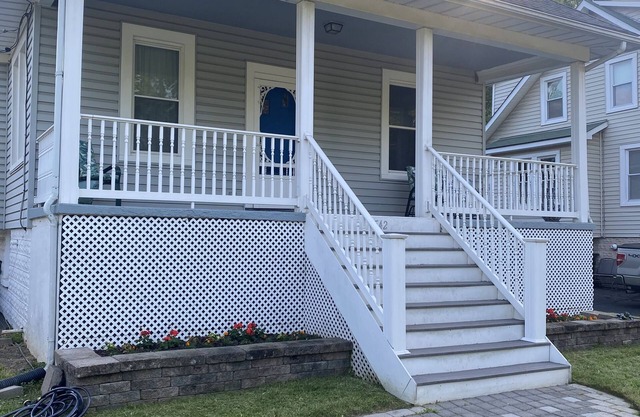 Four bedrooms, porch and parking! Pet-friendly with a large fenced yard.