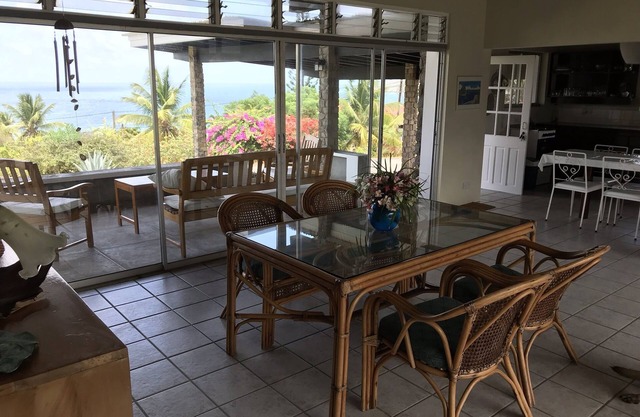 Garden Cottage with sweeping lawn view to the Caribbean Sea and islands