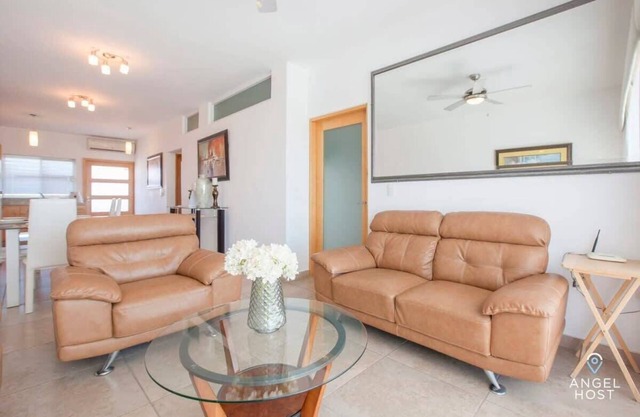 Gated Community Condo with Ocean Views, Balcony, and Pool Access