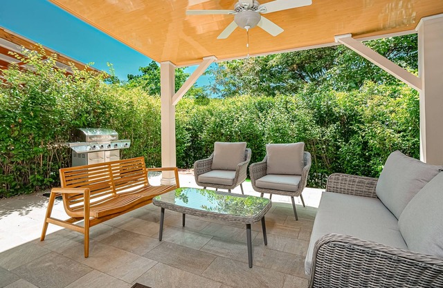 Gated resort condo with on-site pool, outdoor areas, private patio, & W/D