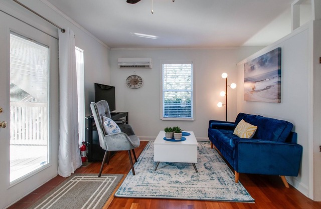 Germantown one bedroom suite with view of lush garden and hot tub