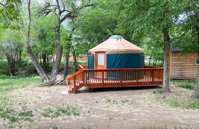 Glamp in style in our 16' yurt, situated on Cedar Creek.