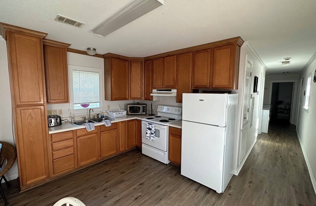 Goin’ Fishing? Bring your pole, fish across the street or Marinas down the road.