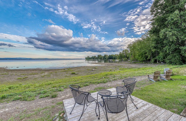 Gorgeous lakefront home with amazing views, sauna, & huge yard