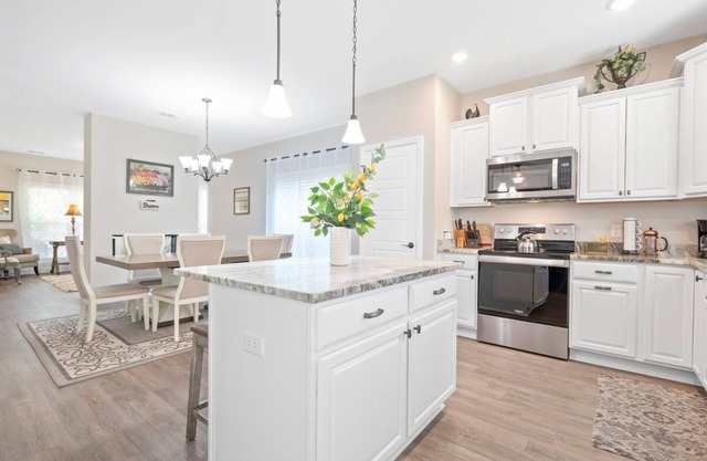 Gorgeous new home, one level & convenient location