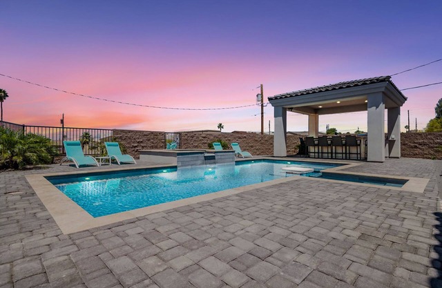 Gorgeous Pool Outdoor Kitchen Home with RV Garage Heated Pool and Spa!