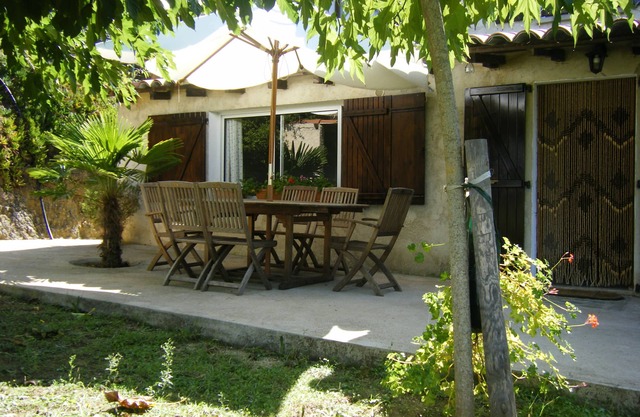 Ground floor garden apartment with sea view.