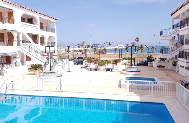 Ground floor in urbanization + pool + A /C + 100m beach + WI-FI + International TV + sea views