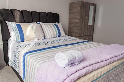 Habitación Privada en Kzona, Cerca al aeropuerto, Ideal para Escalas y Trámites