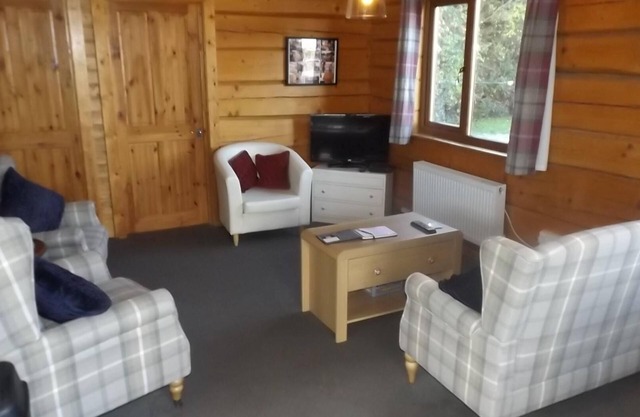 Hand built log cabin at Avonvale Holiday Lodges