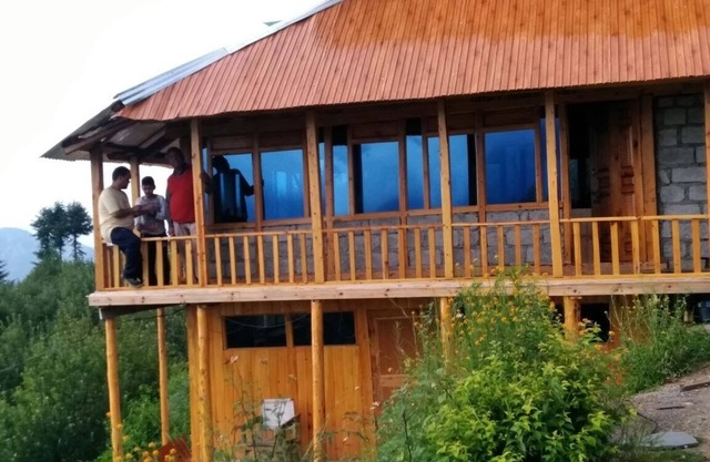 Happy and Peaceful wooden cottage with ample of space in 5 acre of apple orchard