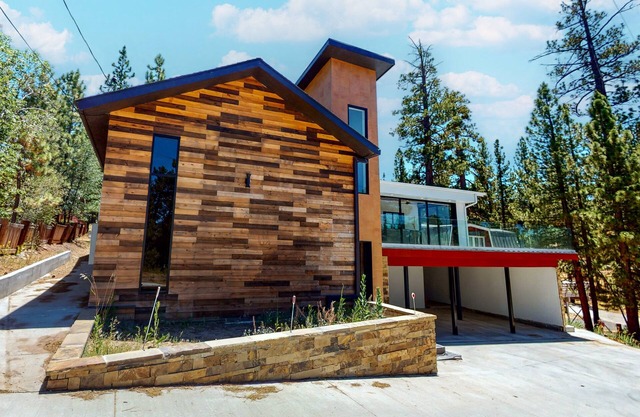 Hillside Hideaway ~ Dog-friendly home with wraparound deck, grill, game room, & bar - walk to dining