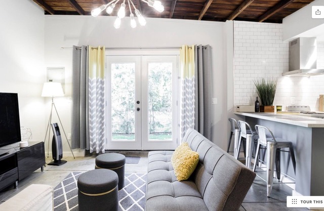 Hip, Loft-Style Guest Suite with Meticulous Custom Design