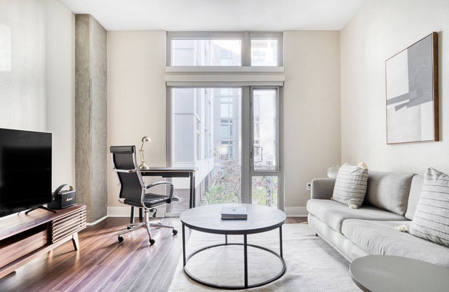 Hip Mission Bay 1BR w/Gym & W/D, walk to Caltrain & Muni, by Blueground