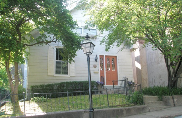 Historic home ideally located on famed Snake Alley, a one of a kind location.