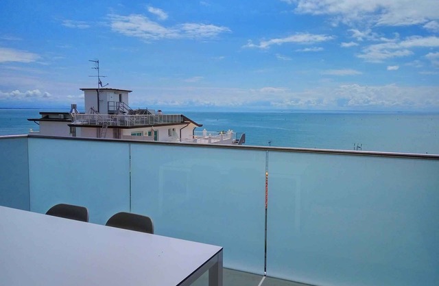 Holiday apartment with balcony and panoramic sea view