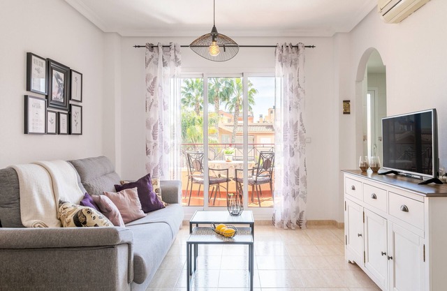 Holiday Apartment with Sea View, Shared Pool & Jacuzzi, Terraces, Garden & Wi-Fi