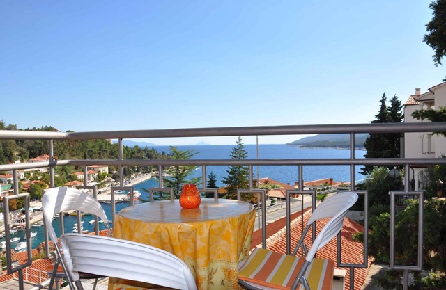 Holiday apartment with a balcony and sea view