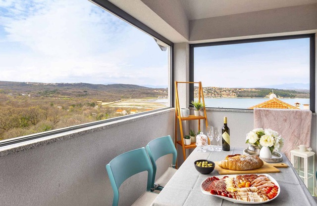 Holiday apartment with a balcony and sea view