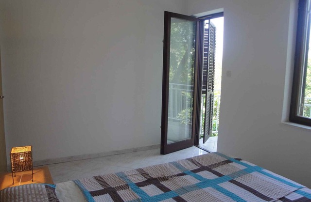 Holiday apartment with air conditioning and terrace with sea view