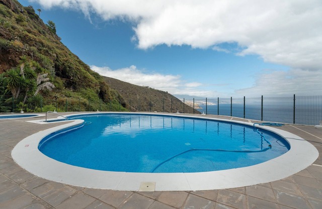 Holiday Studio 'The Blue Lighthouse' with Sea View, Shared Pool and Wi-Fi